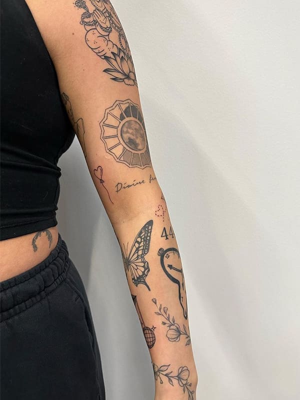 black patchwork tattoo sleeve