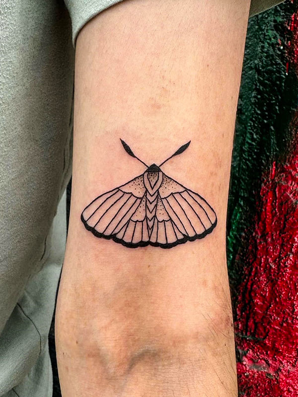linework moth tattoo