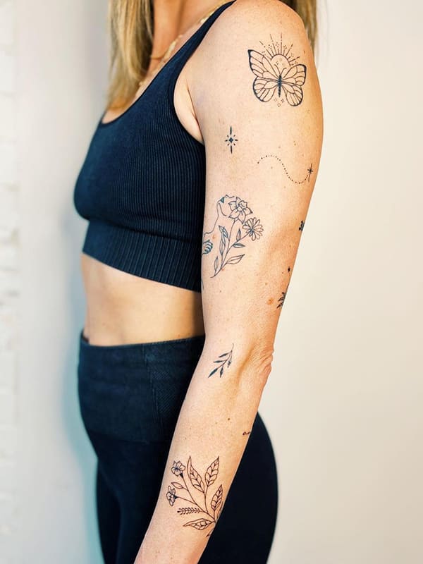 minimalist patchwork sleeve tattoo