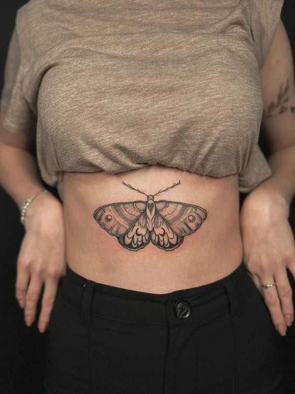 moth sternum tattoo