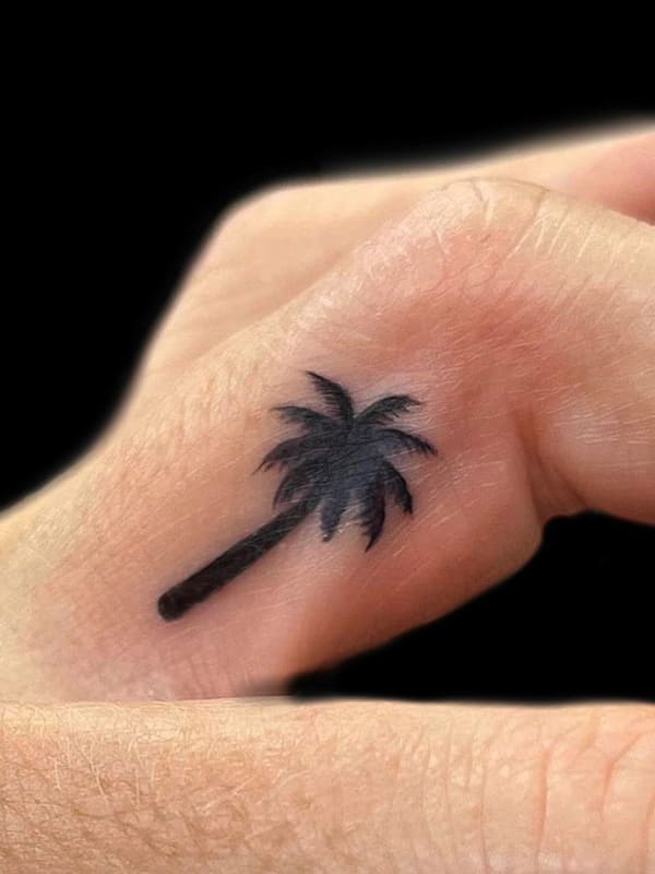 palm tree finger tattoo