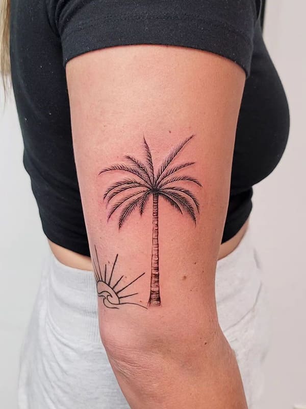 palm tree forearm tattoo