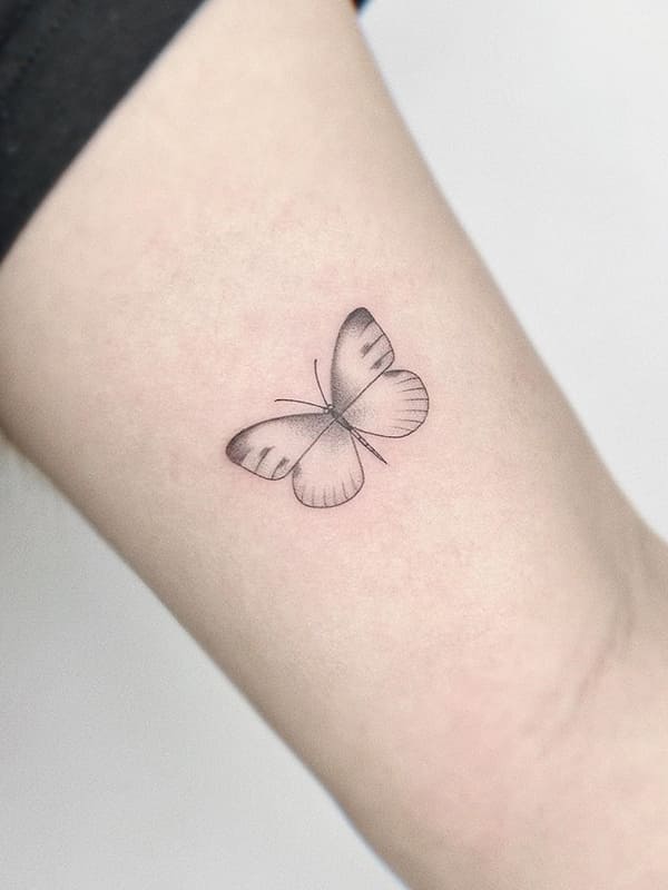 simple moth tattoo