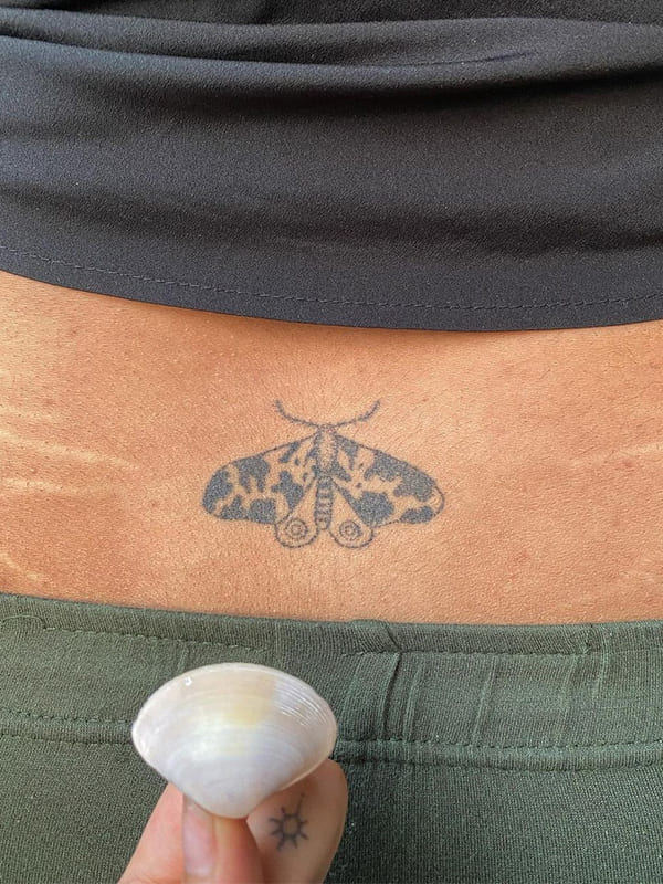 small moth tattoo